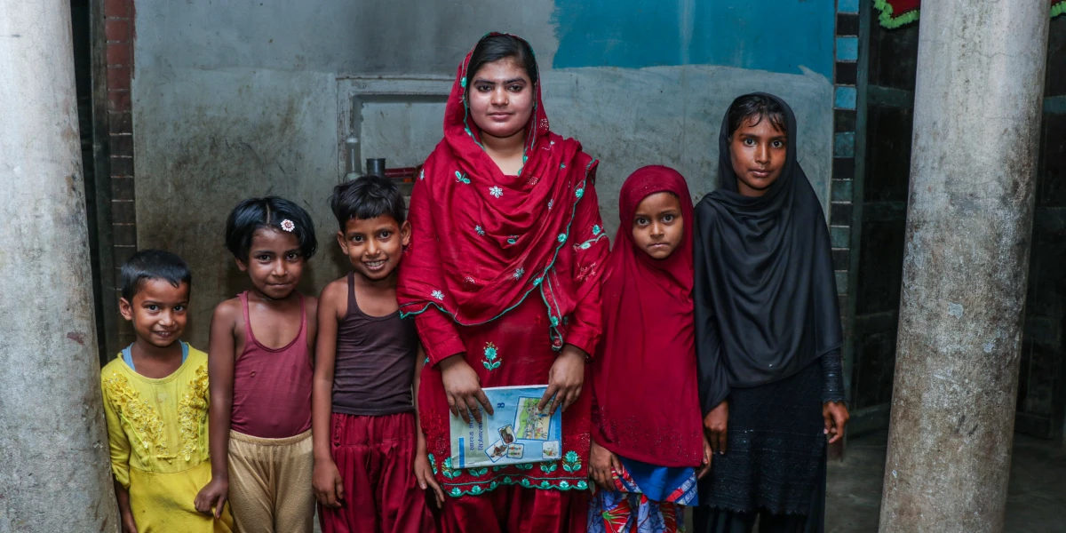 Aaman Tara Khatun (Despite  of being married, husband supported to enroll in school) from Rajpur-3, Baluwa. While studying in CLC, she got change to boost her knowledge and learning proficiency. During the period, she had interest to go to school and wanted to achieve higher study. But her father didn’t allowed stating the reason that she was already married and it is not their culture to go to school for married girl.  Later, she shared about the activities of CLCs and interest to go to school. It is her husband who persuade her father and family to enroll in school. Because of him, she got enrolled in 7th Grade in Kishan Ma vi, Baluwa. Now, she regularly goes to school. She is also a active listener and a speaker.